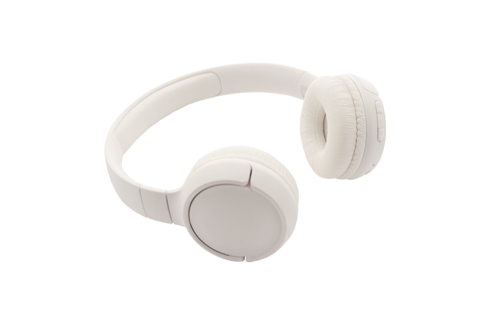 White over-ear headphones on a light background